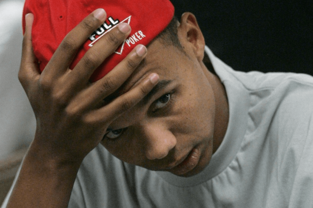 Phil Ivey, the face of Full Tilt Poker, wearing the site's baseball cap at a live tournament.