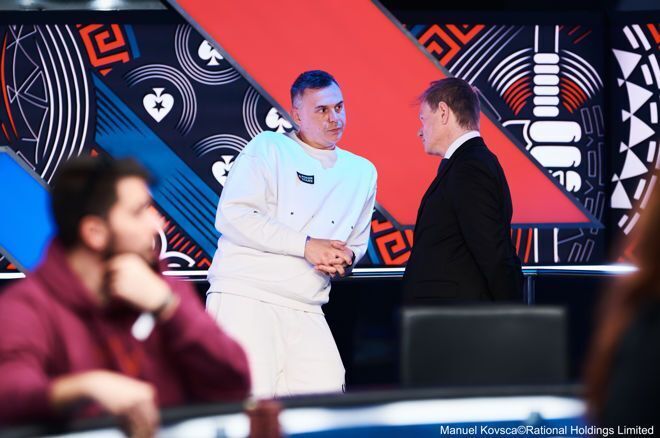 Aleksandr Shevliakov at the EPT Monte Carlo Main Event final table, listening attentively to the floorman’s ruling during a disputed hand.