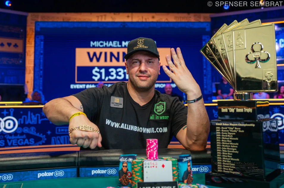 Michael Mizrachi celebrates winning his record fourth $50K Poker Players Championship at the 2025 WSOP, posing with the Chip Reese Memorial Trophy.